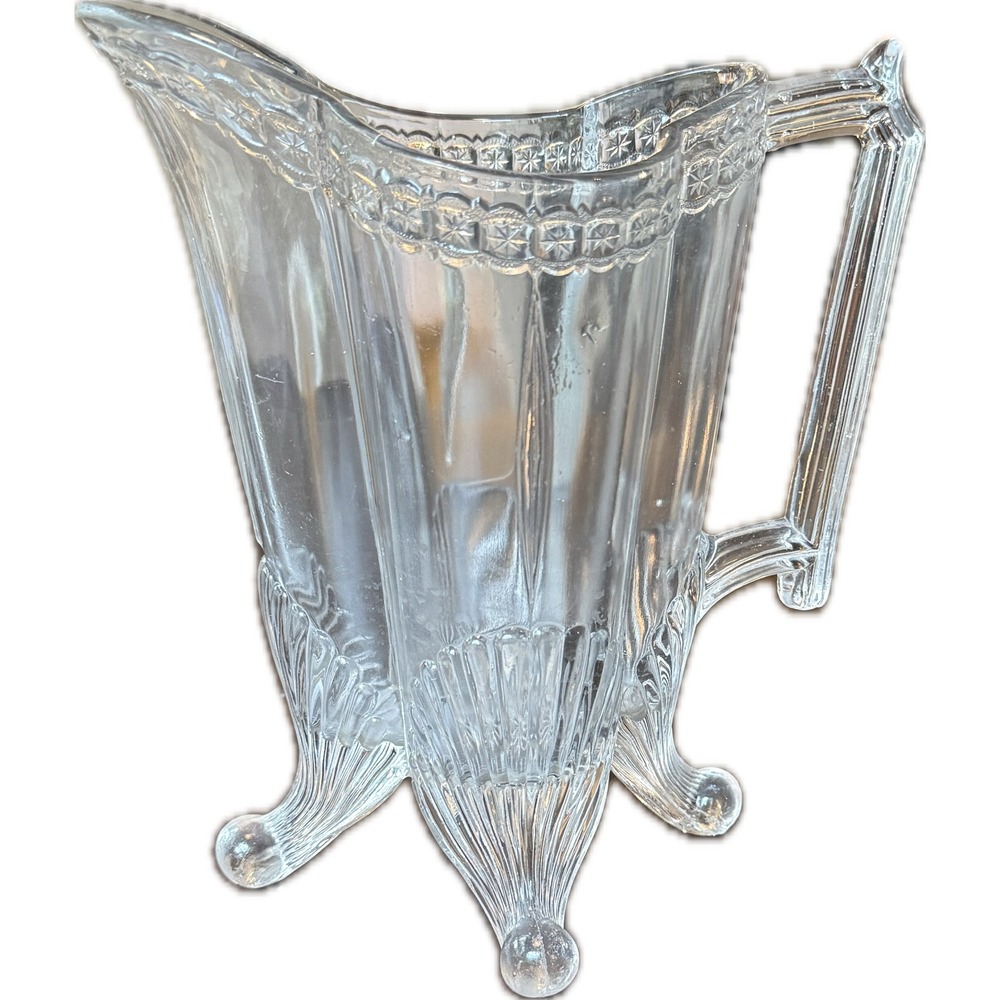 Vintage Clear EAPG Glass Pitcher Four Footed Shell Starburst Design, 9.5in tall
